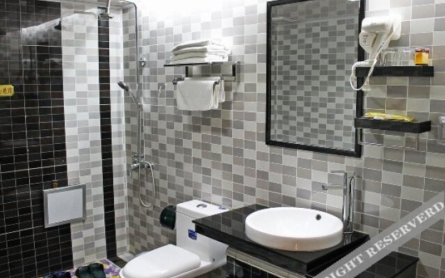 Ease Hotel (Qiqiha'er Zhonghuan Dashang Xinmate Branch)