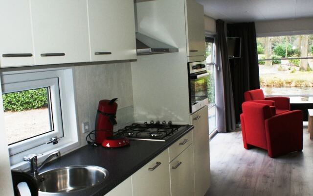 Modern chalet with two terraces and near a pond