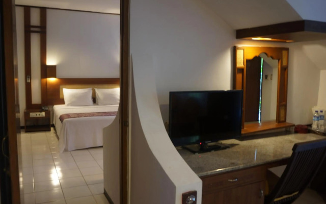 Puri Naga Beachfront Cottages
