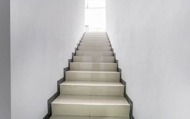 OYO Titik Koma Guest House