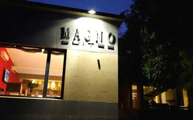 Magno Suites Hotel