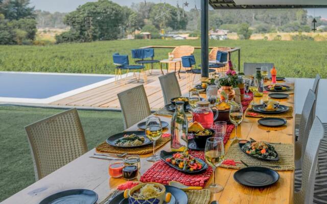 SaffronStays Onellaa, Nashik - infinity pool villa surrounded by a vineyard