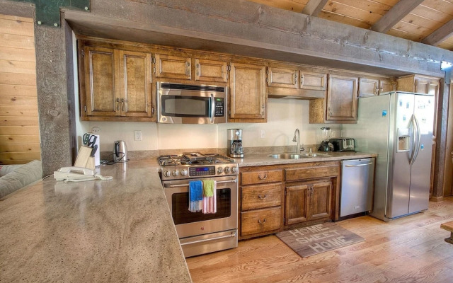 Remodeled Gambrel Style Home with Trees Views by RedAwning