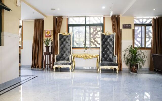 Yi Long Hua Chen Impress Business Hotel