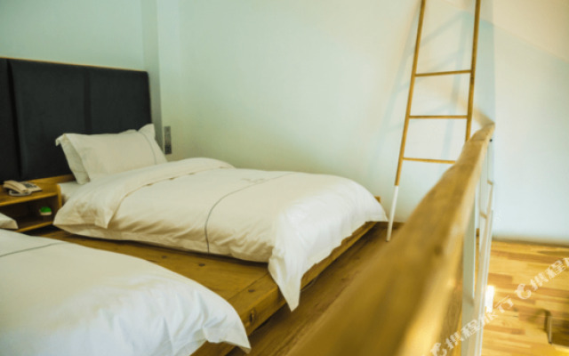 Xichang Shuxia Hotel