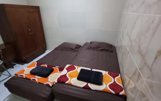 Spot On 3988 Kost Carmelia Baranangsiang Syariah – Guest Rooms – Bogor