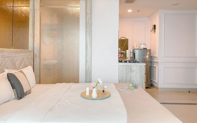 Homey and Restful Studio Grand Kamala Lagoon Apartment