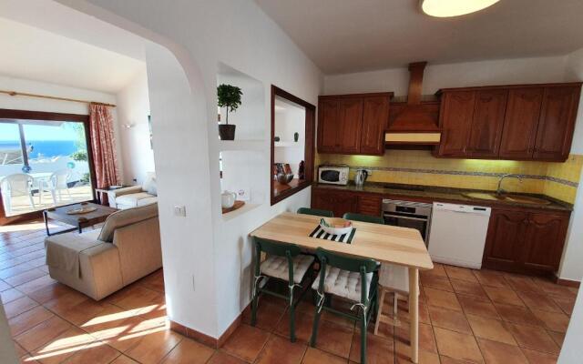 2 bedroom villa 'The Bungalow' with private heated pool.