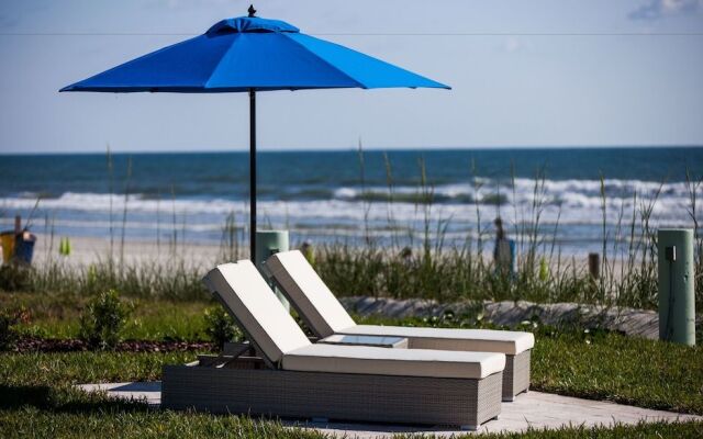 The Salty Mermaid Oceanfront Hotel