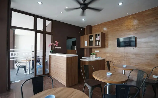 Oyo 932 Griya Mas Residence Syariah