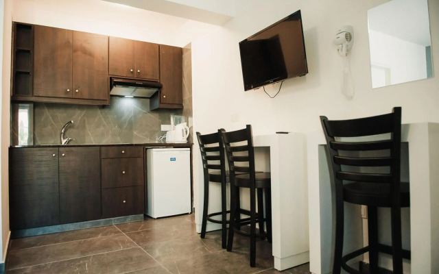 A. Maos Hotel Apartments