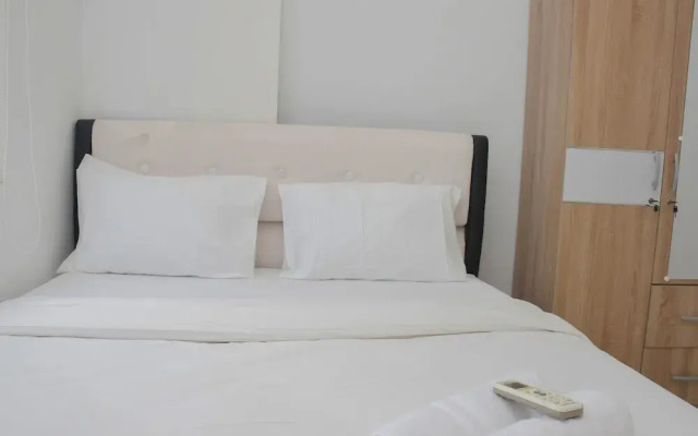 Cozy Style 2BR at Green Pramuka City Apartment