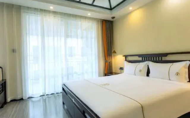 Jizhu Holiday Apartment (Menghai Mengbala Store)