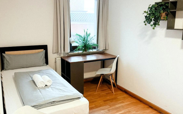 Suiteable Living - Boardinghaus mit Parkplätzen, WLAN und Waschraum