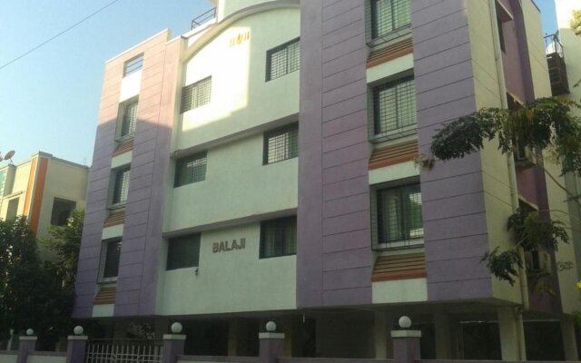 FabHotel Balaji Comfort Homes