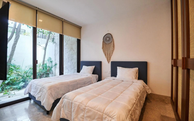 Omara 2-BR Pool · Tropical 2-BR Condo With Private Pool + Amenities!