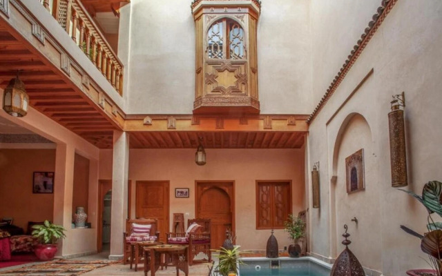 "room in Guest Room - Riad Lakouas Triple Room With Pool View"