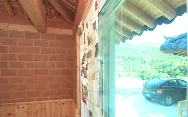 Sanasa Red Clay House