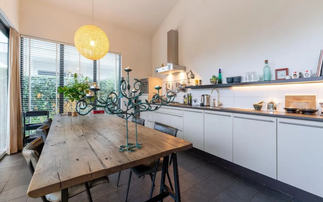 Cozy Forest Villa on the Water Near Harderwijk