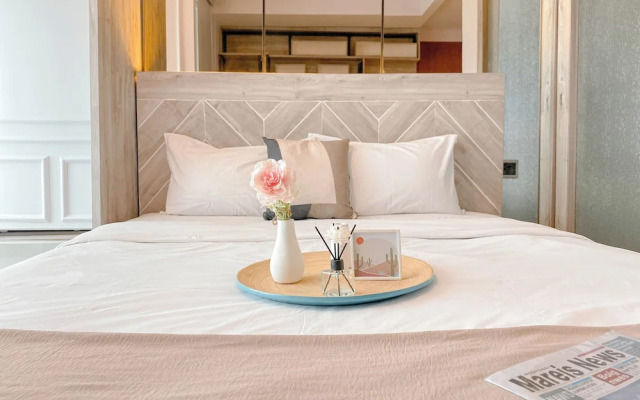 Homey and Restful Studio Grand Kamala Lagoon Apartment