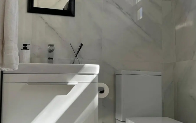 Kick back and relax in this calm, stylish space