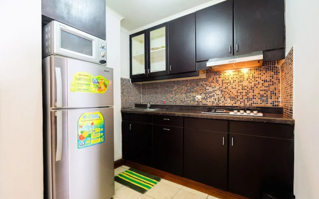 Elegant Minimalist 1BR Puri Imperium Apartment