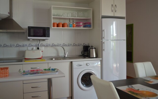 Ground floor apt with kitchenette, private patio, west facing