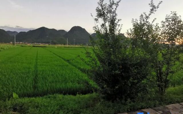 Puzhehei Yidu Homestay (Hehua Daguan Garden)