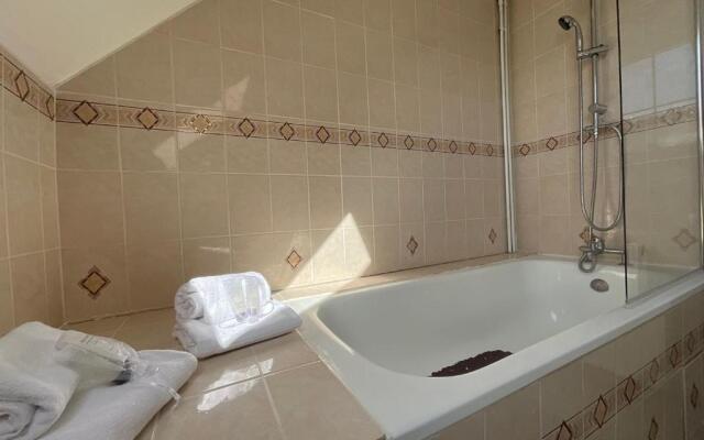 House With Garden In The Centre And Near Beach