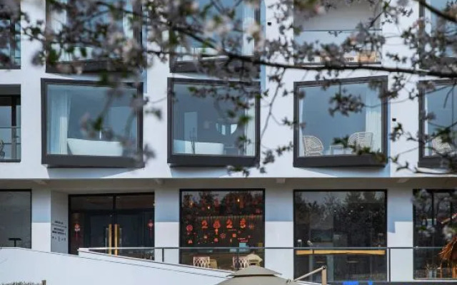 Dongmei Yueju Qiyue Yunsu Hotel