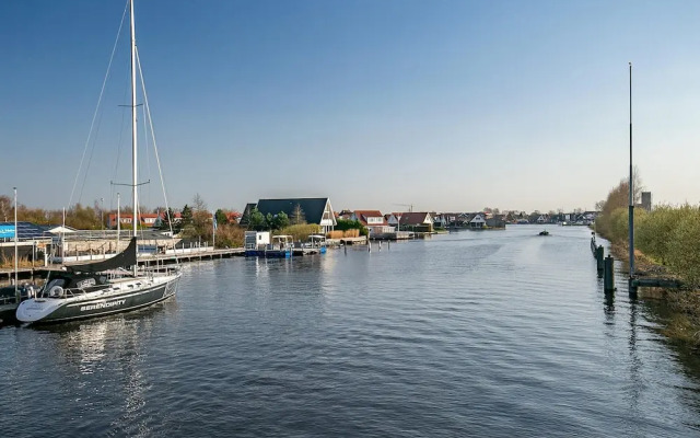 Nice Holiday Home on the Water in Grou