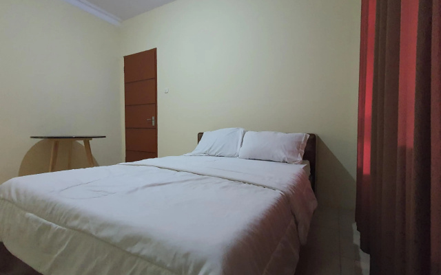 Hotel O Kost Reski 1 Near Pasar Rakyat Limbung – Guest Rooms – Coring