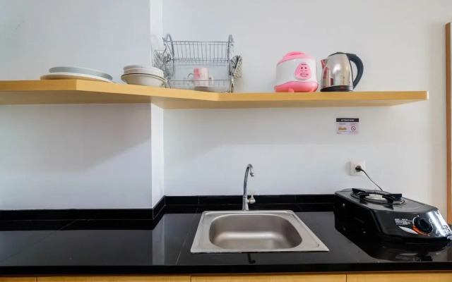 Homey and Comfy Studio Tamansari Mahogany Apartment
