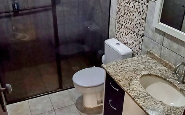 Casa com Piscina e Churrasqueira