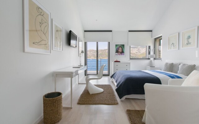 Beachfront Villa Poseidon with Heated Pool