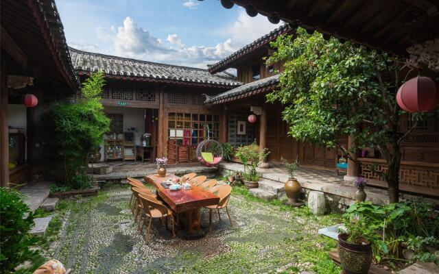 Blossom Hill Inn Lijiang Weavingland