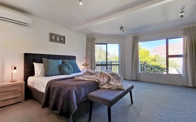 Mountain, lake, sun and this beautiful home