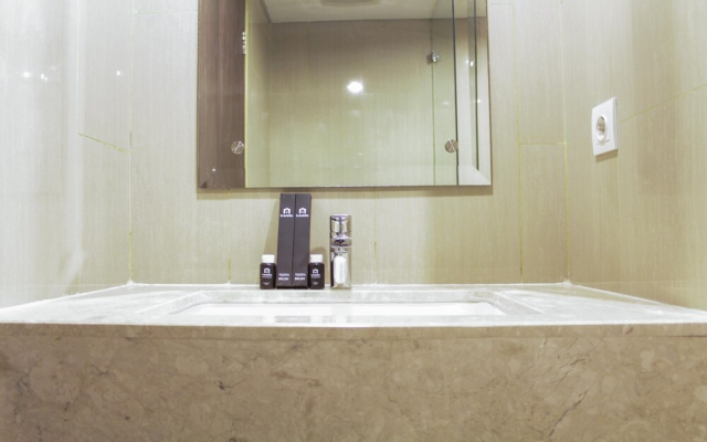 Modern 1BR Apartment with City View at H Residence