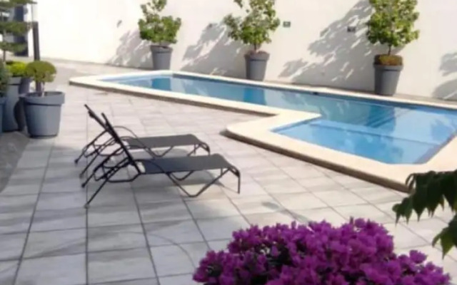 Tu joya Tapatia - Apartamento con alberca y aire acondicionado