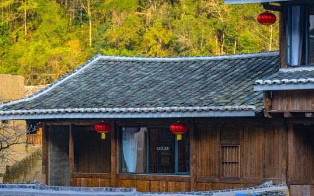 Yongding Earth Building Duilu · Shengheng Building World Heritage Home Stay – Exterior – Longyan