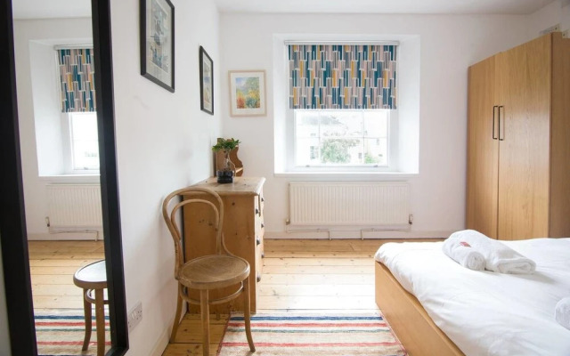 Bohemian top Floor Apartment With Views Over City