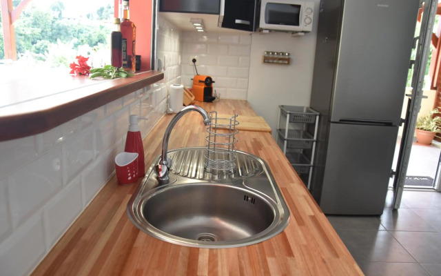 Haut de villa dans son écrin de verdure