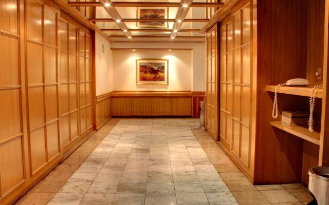 Suites Real 97