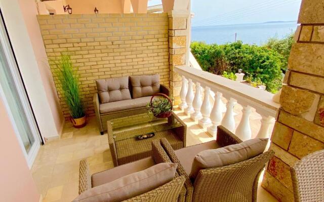 Nissaki Sunlight - New Home Above the beach