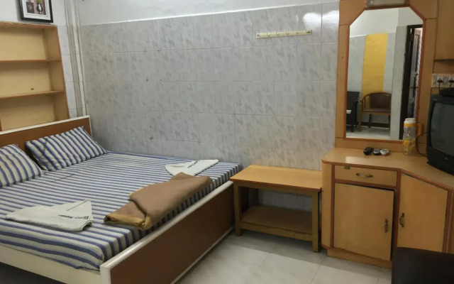 New Victory Mansion & Lodging by OYO Rooms