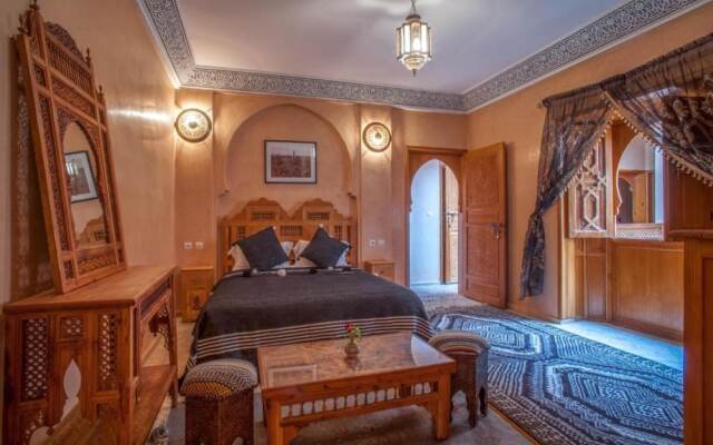 "room in Guest Room - Riad Lakouas Triple Room With Pool View"