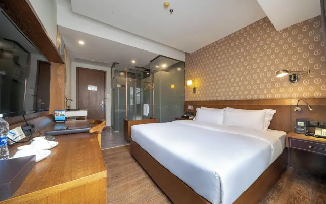 Xingyi Chain Hotel Jiangxia Metro Station