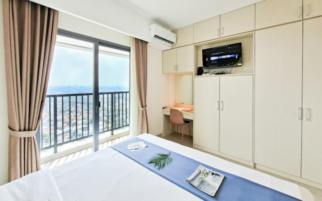 Wooden Accents 1Br Without Living Room At Bintaro Embarcadero Apartment