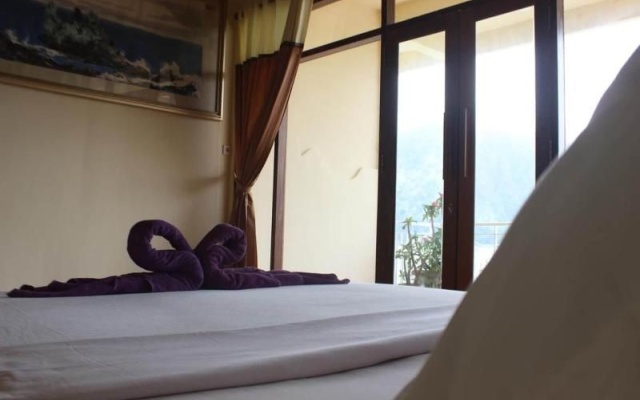 Penginapan Lakeside Cottages by ZUZU – Guest Rooms – Kintamani