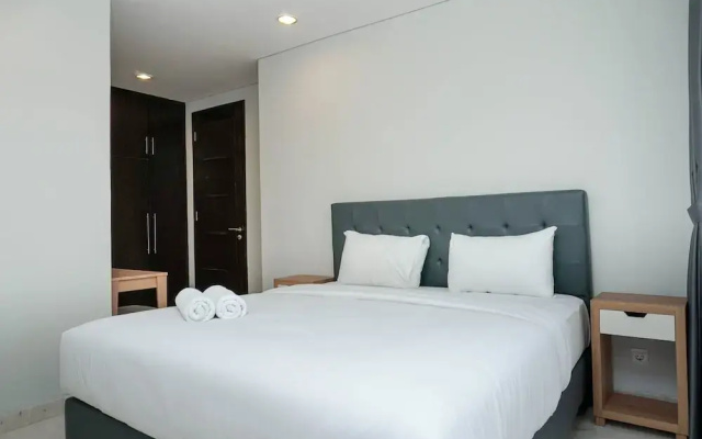 Cozy 2BR at Empyreal Epicentrum Apartment By Travelio
